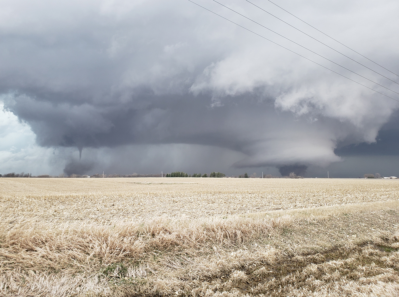 Three tornadoes in the distance