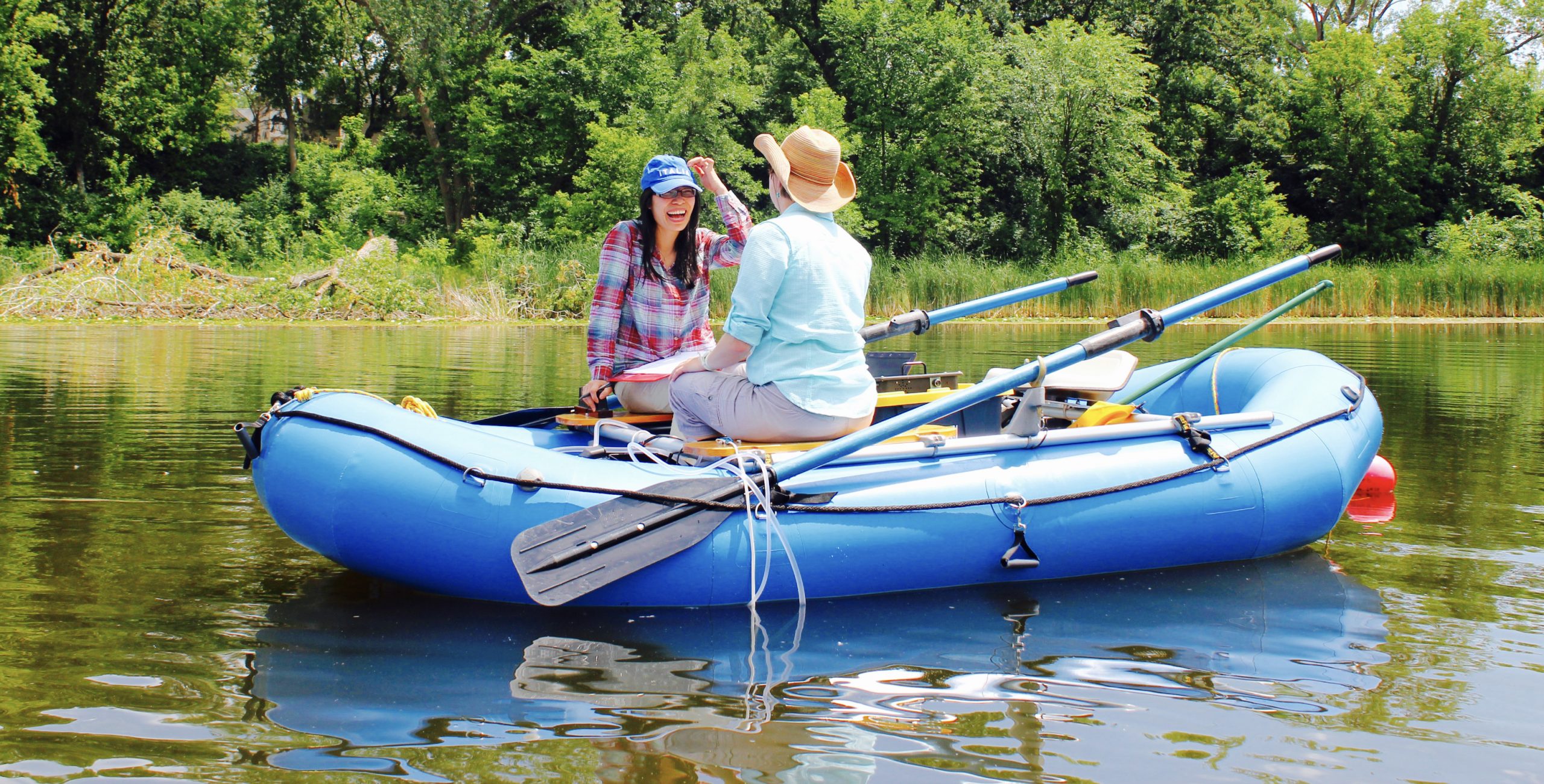 Student and professor on a raft